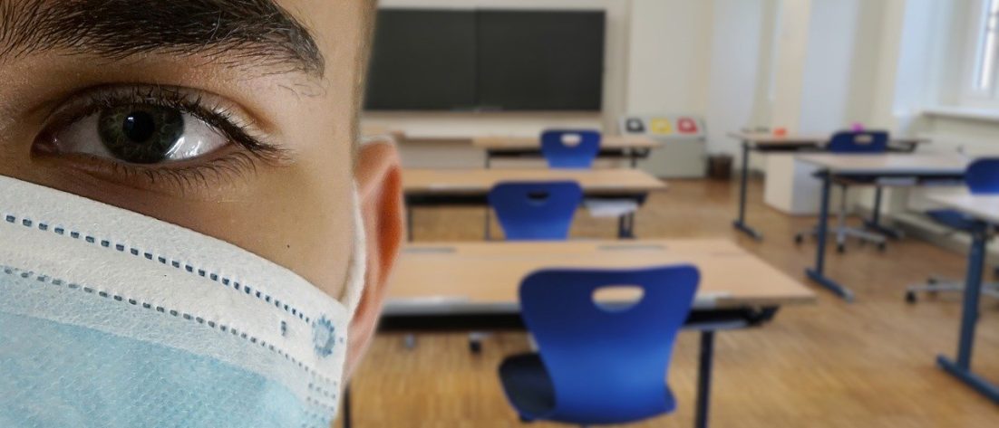 Student wearing mask in a classroom